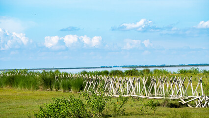 View of River Brahmaputra with clouds in the sky and porcupines for flood control 3
