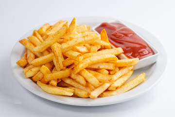 Plate of French fries and ketchup