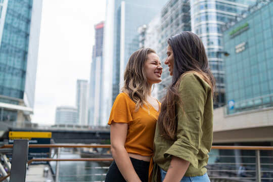 Happy lesbian couple in the city, London, UK