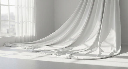  A stream of sheer white fabric drapes gracefully from a ceiling, pooling on the floor in soft folds, illuminated by sunlight from a nearby window.