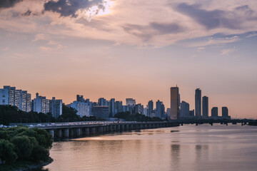 Yeouido, the financial district of Seoul, Korea, and the surrounding city scenery taken during the summer sunset