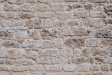 Textured stone wall surface background - Natural stone wall surface