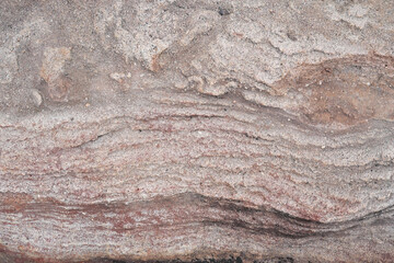Natural red rock wall with wavy Cross-Bedding texture