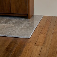 Close up of a marble floor transition to hardwood flooring