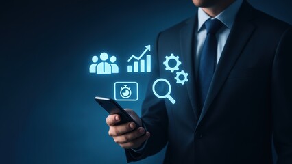 A businessman professional in a suit holds a smartphone surrounded by glowing business icons like growth charts and analytics, Enterprise Resource Planning System, erp, sap