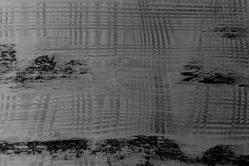 Abstract texture display showcasing patterns and lines in monochrome colors