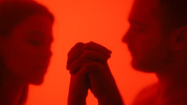 Abstract Art with Two Blurred People in Red Light