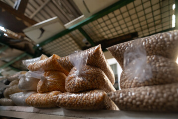 Grains and seeds for sale inside a bag at a traditional fair. Healthy seeds.