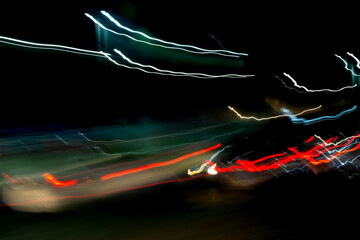 Abstract background with bright, multicolored light rays in motion. Copyspace concept. Photo effect.