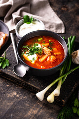 Traditional Ukrainian borsch with sour cream
