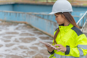 Environmental engineers work at wastewater treatment plants,Water supply engineering working at...