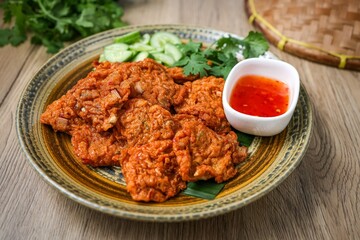 fried fish paste balls,Thai fish cake on wooden background