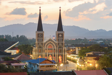Fototapeta premium Old Catholic Church with a beautiful sunrise in Chantaburi province, Thailand.