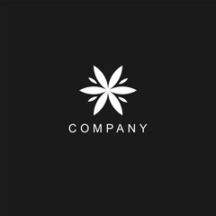 Minimal floral star logo in white on a black background, suitable for wellness, spa, or natural beauty brands.
