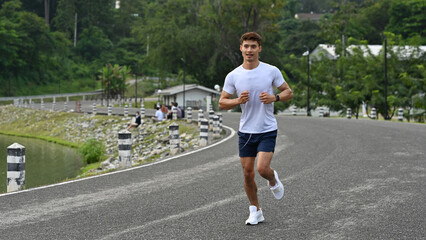 An Asian Male athlete running outdoors in sportswear, promoting health, energy, and cardio training