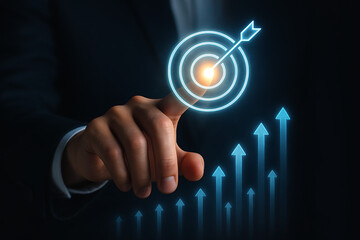 Finger pressing glowing target icon with arrows rising upward reflecting strategy business planning success and goal achievement in futuristic digital innovation environment