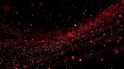 Red particles against a dark background with subtle light effects bokeh