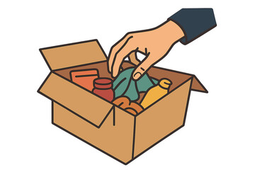 A hand is tossing used clothing into a cardboard box designated for recycling and donation