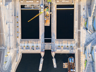 Vattentorget, Slussen, Stockholm, vertical view of people walking on the bridge over the water...