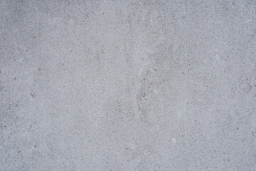 Light blue concrete texture background with subtle detail and fine surface grain