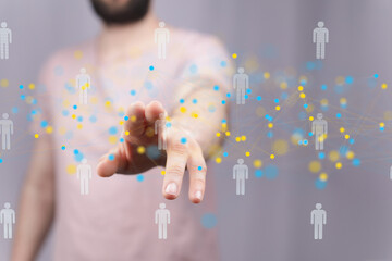 Abstract image of a person interacting with a digital network, representing connection and...