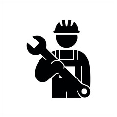 Black silhouette of a worker in overalls and hard hat holding a wrench tool