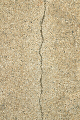 Old terrazzo walkway with cracks and cracks