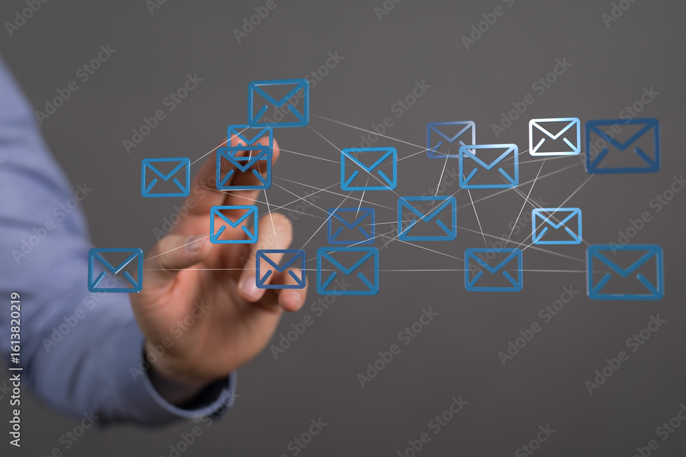 Poster image of a hand interacting with a network of email icons, representing global communication and con