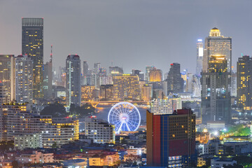 Landscape view of the residential and business district in Bangkok. Ferris wheel is an important...