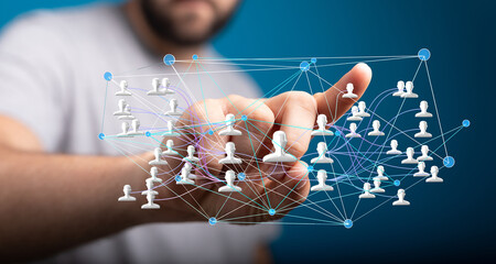 Image of a person interacting with a network of people, illustrating teamwork and global connection.