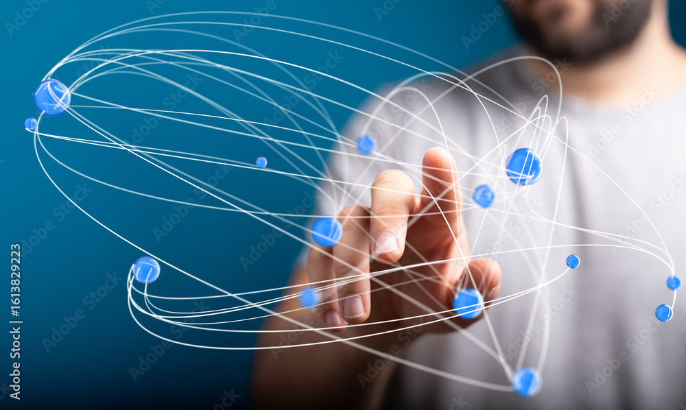 Poster abstract image depicting a man connecting digital nodes, representing global networks and connection