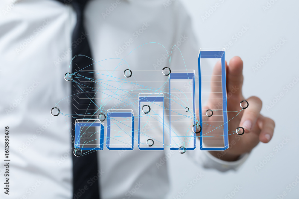 Aufkleber stock photo of a businessman interacting with a digital bar chart showing growth and data connection