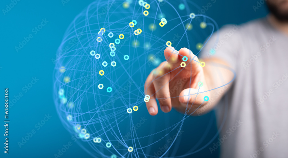 Poster abstract image depicting a hand interacting with a digital network, representing global connections 