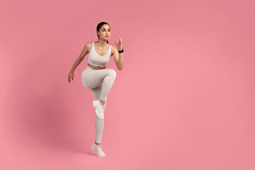 High-Intensity Interval Training. Full Body Length Of Confident Sporty Young Woman Lifting Leg Up,...