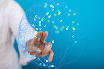 Hand interacting with a digital network, representing connection and technology.