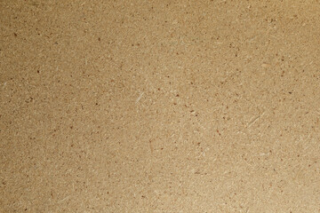 High-resolution image of brown particleboard texture, perfect for backgrounds and design projects.