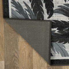 The specially designed carpet was laid on the floor and folded into a square format so that its...