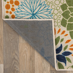 The specially designed carpet was laid on the floor and folded into a square format so that its...