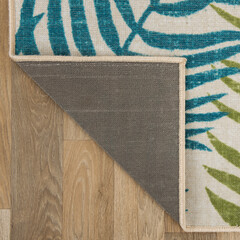 The specially designed carpet was laid on the floor and folded into a square format so that its...