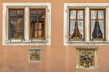 Rothenburg ob der Tauber, Bavaria, Germany: Facade with decorative elements of one old houses in...