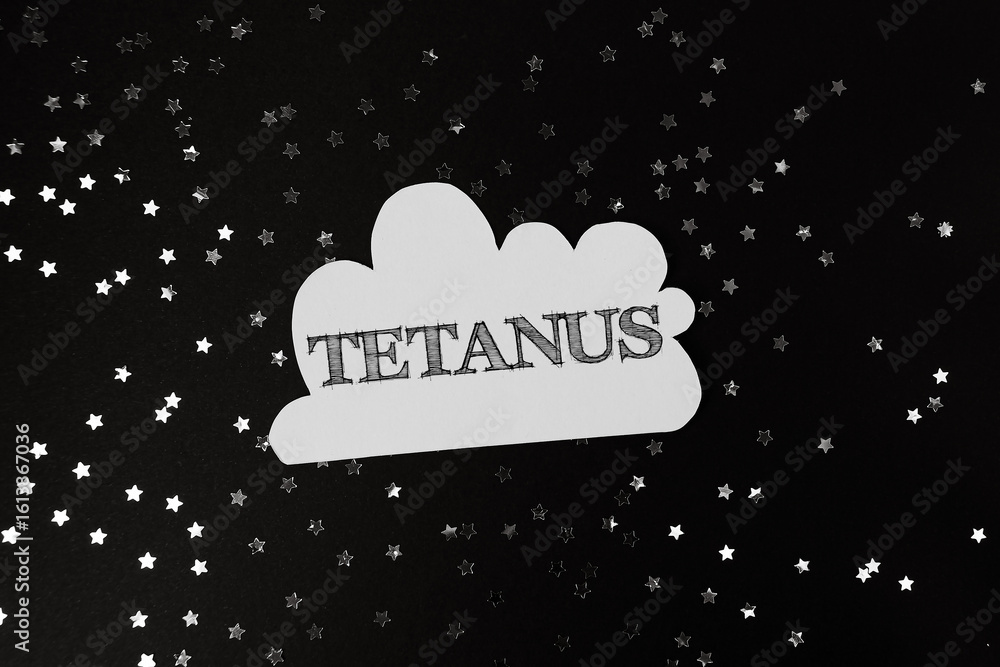 Poster tetanus text on a cloud shape surrounded by sparkling stars on a dark background
