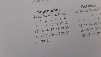 marking September 26 date on the calendar	
