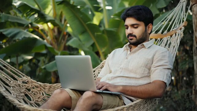 Relaxed Freelancer Enjoying Work-Life Balance in a Peaceful Outdoor Setting