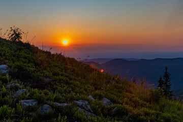 beautiful sunrise in the mountains in summer