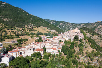 Fototapeta premium Italy 02 july 2025: Villalago, a charming medieval village in Abruzzo, Italy, nestled in the mountains near Scanno. Stone houses, narrow alleys, and timeless beauty in the heart of nature.