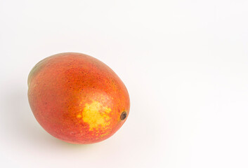 Ripe colorful mango fruit isolated on white background, tropical and juicy
