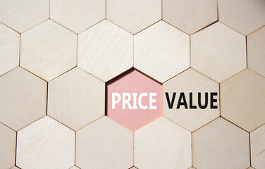 Price and Value symbol. Concept word Price and Value on wooden comb puzzle. Beautiful pink...