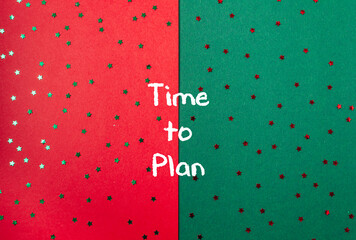 Festive red and green background with scattered stars and handwritten message for planning