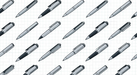 Naklejka premium A detailed closeup view of a collection of modern silver and black ballpoint pens