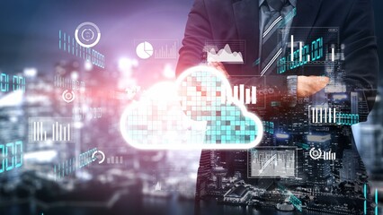 A businessman interacts with cloud technology, showcasing data analysis through digital visuals and...